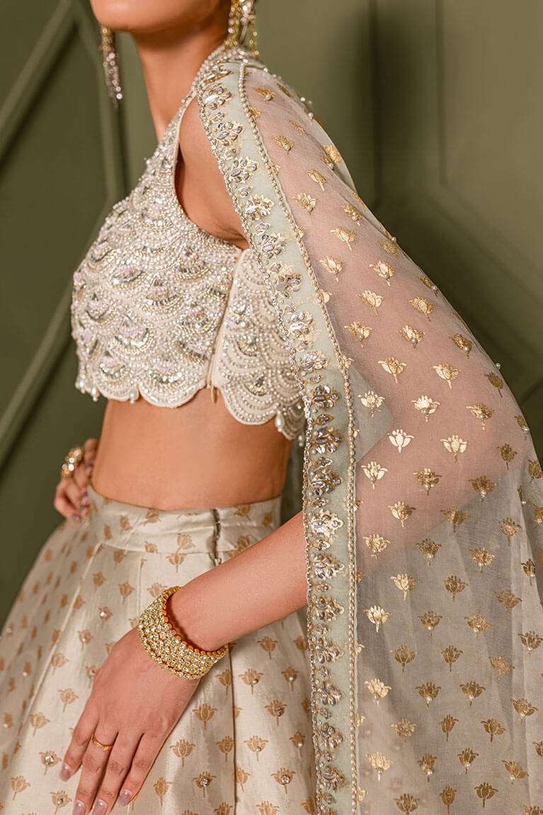 Ivory lehnga choli with screenprint